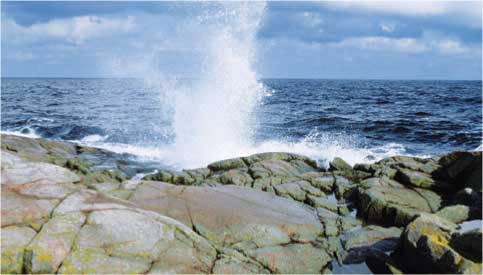 waves against rocks