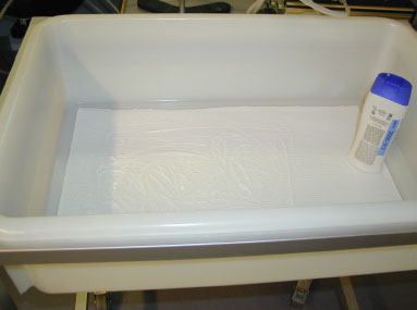 Figure 2. Hair conditioner. The plastic tray with non-absorbing material was used for sealant, adhesive, hair conditioner, and hair spray.
