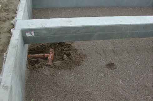 Figure 3. In the bottom of the closed biobed box, was a layer of 15 cm sand with a drain pipe connected to the reservoir with a possibility to close the drainage with a valve. On top of the sand was a 10 cm layer of clay compressed by walking on it. 