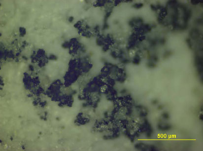 Figure 6.2 Picture of filtered-off particles on filter paper from leaching test with infill 14, enlarged
