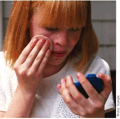 Woman putting on make up