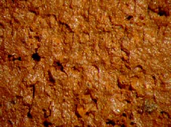 Figur G.39. Prøve E Sønderskov – glasmel 1050ºC Synsflade – Forstørrelse 24x