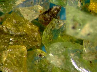 Figur 2.4: Glassand, Fraktion 1-2 mm. Forstørrelse 24×