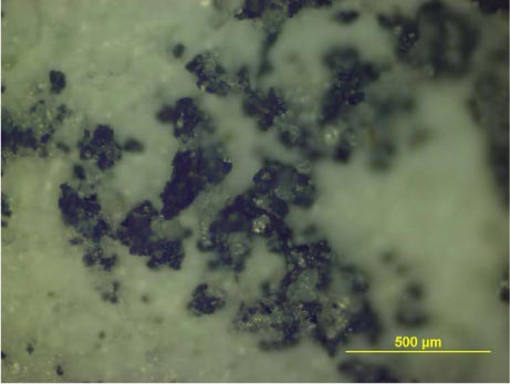 Figur 6.2 billede af frafiltrerede partikler på filterpapir fra udvaskningsforsøg med infill 14, forstørret